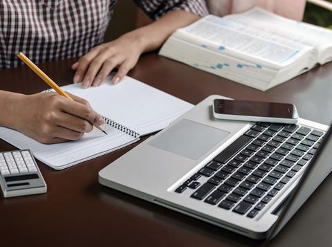 Person working at computer.
