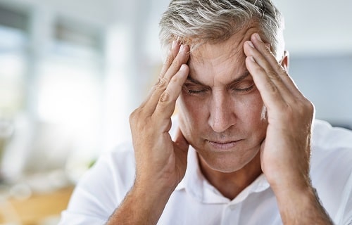 Man With Migraine iStock PeopleImages