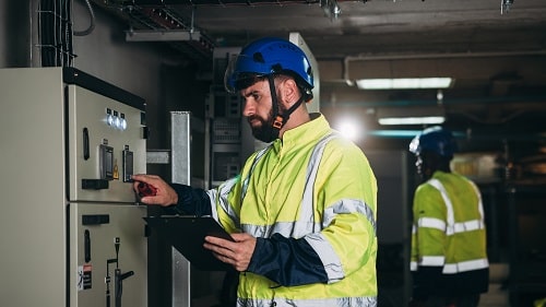 Worker Carrying out Checks iStock NewSaetiew